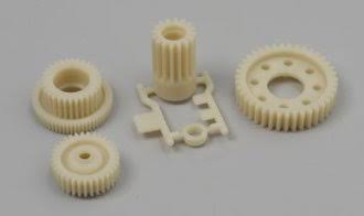 Tamiya 50704 - Boîte de vitesses tunée - pignon principal M 0,4 et denture fine . Pour les modèles équipés d'un châssis TA-03F ou TA-03R - 1/10