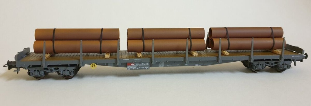 HAG 355 -70031 - Wagon plat à ranchers type Rs ( SBB/CFF/FFS) chargé de conduites de gaz- HO (DC) 