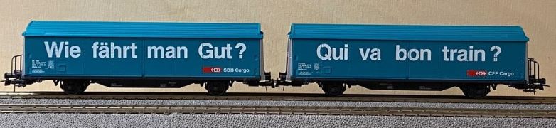 Roco 44126 - Set de wagons Marchandises "Qui va bon train ?" Cargo (2 pièces) - SBB - HO 